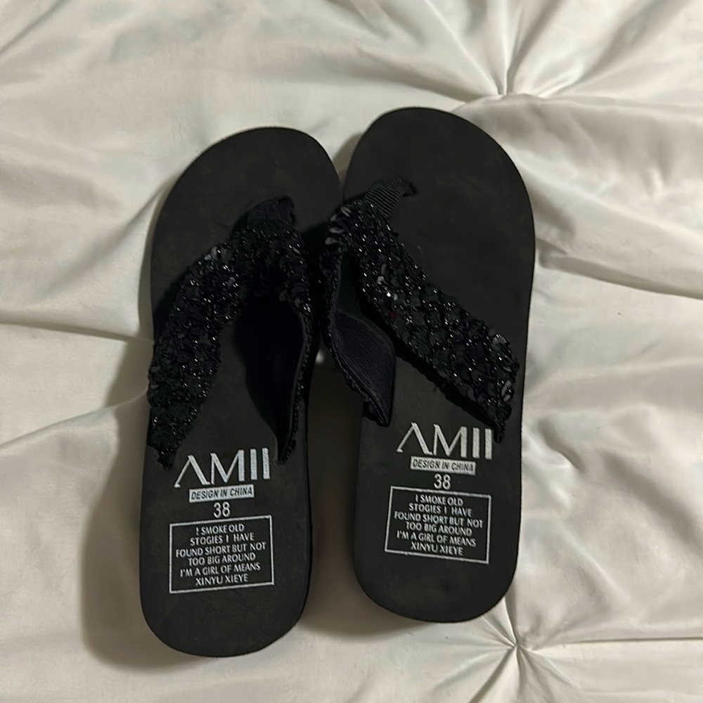 Black sequin thongs